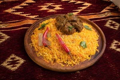Plate of delicious biryani rice with meat,  traditional Arabic dishes, Arabic food, popular dishes, delicious recipes and dishes, delicious food