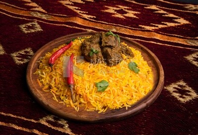 Wooden plate of delicious biryani rice with meat,  traditional Arabic dishes, Arabic food, popular dishes, delicious recipes and dishes, delicious food