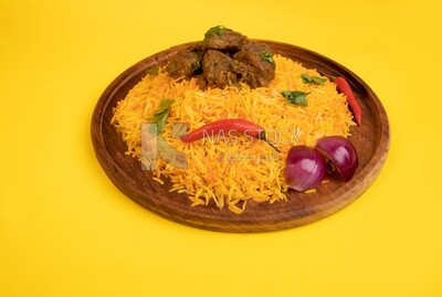 Wooden plate of delicious biryani rice with meat,  traditional Arabic dishes, Arabic food, popular dishes, delicious recipes and dishes, delicious food