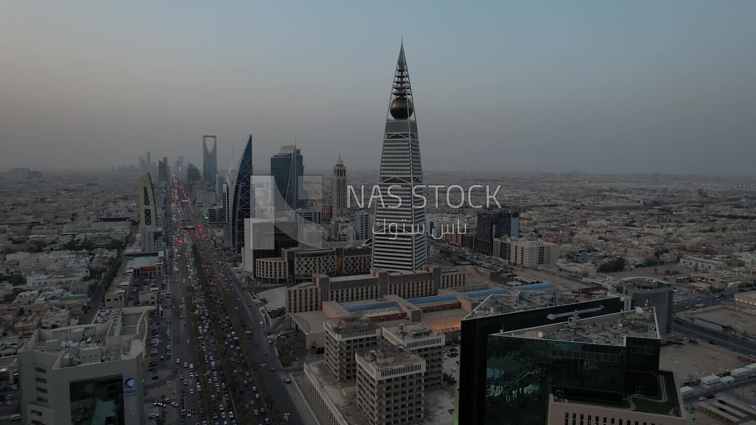 drone footage of  Al-Faisaliah Tower in Riyadh, the towers on King Fahd Road, famous towers in Riyadh, Riyadh roads and streets, car traffic in Riyadh