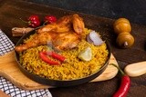 Plate of kabsa rice with chicken, traditional Saudi food, Saudi restaurant, Saudi dishes