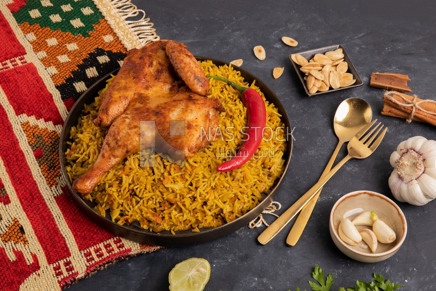 Plate of kabsa rice with chicken, traditional Saudi food, Saudi restaurant, Saudi dishes