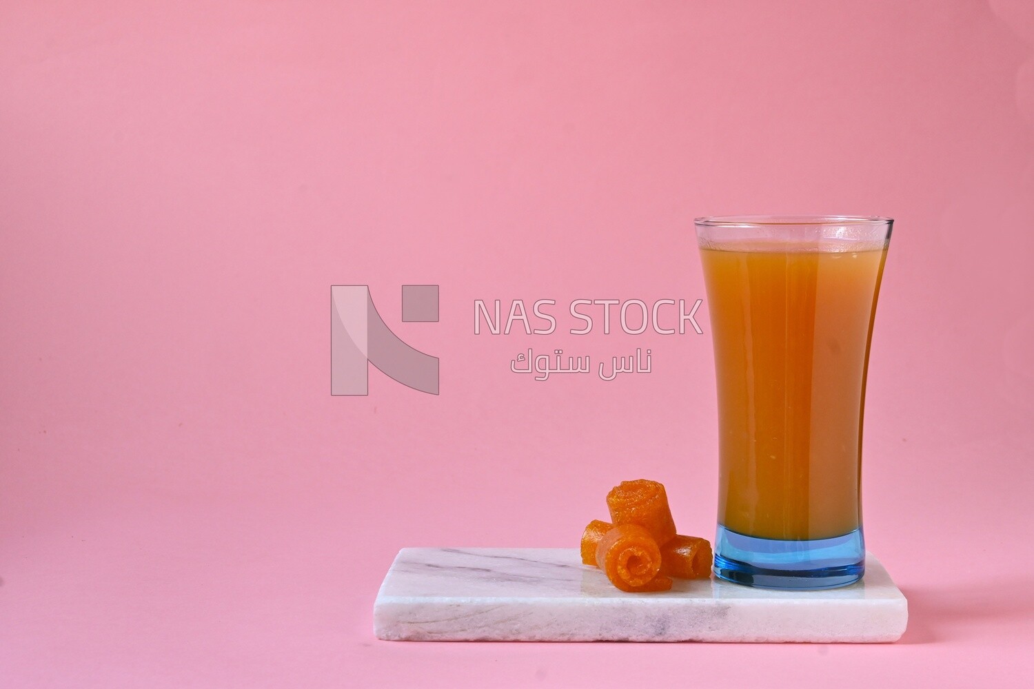 Cup of Qamar Al Deen juice with dried apricots, Ramadan juice, delicious juice, traditional juice