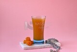 Cup of Qamar Al Deen juice with dried apricots, Ramadan juice, delicious juice, traditional juice