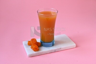 Cup of Qamar Al Deen juice with dried apricots, Ramadan juice, delicious juice, traditional juice