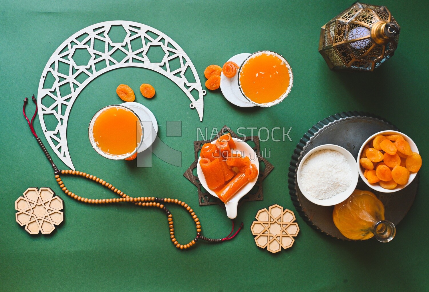 Two cups of Qamar Al Deen juice with dried apricots, Ramadan juice