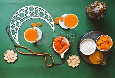 Two cups of Qamar Al Deen juice with dried apricots, Ramadan juice