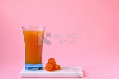 Cup of Qamar Al Deen juice with dried apricots, Ramadan juice, delicious juice, traditional juice