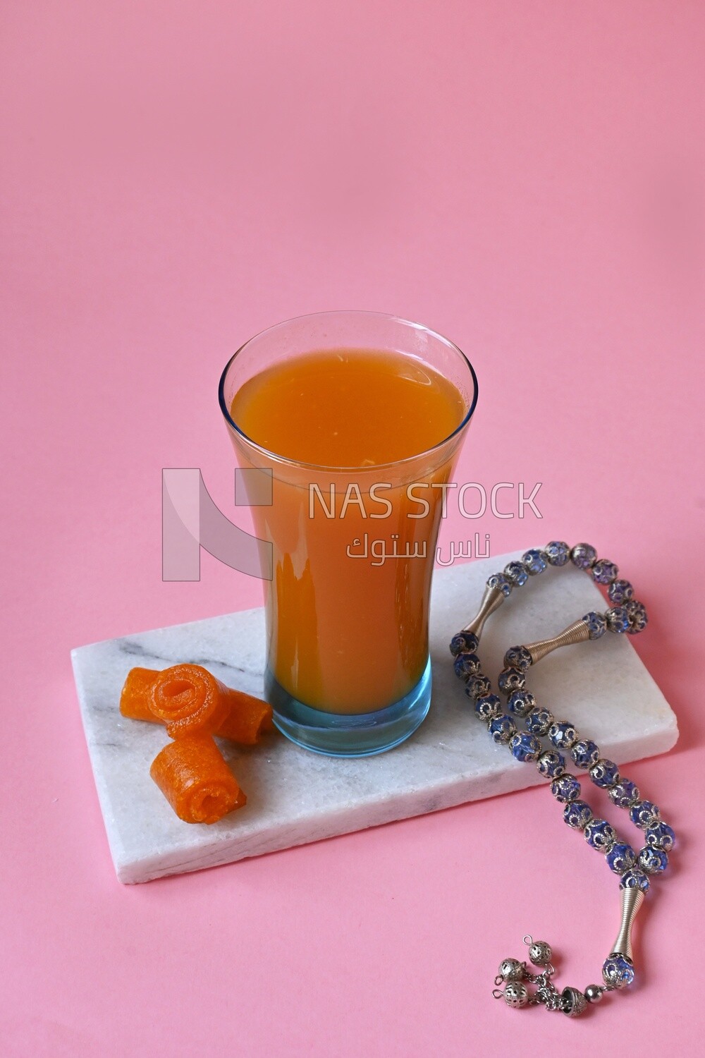 Cup of Qamar Al Deen juice with dried apricots, Ramadan juice, delicious juice, traditional juice