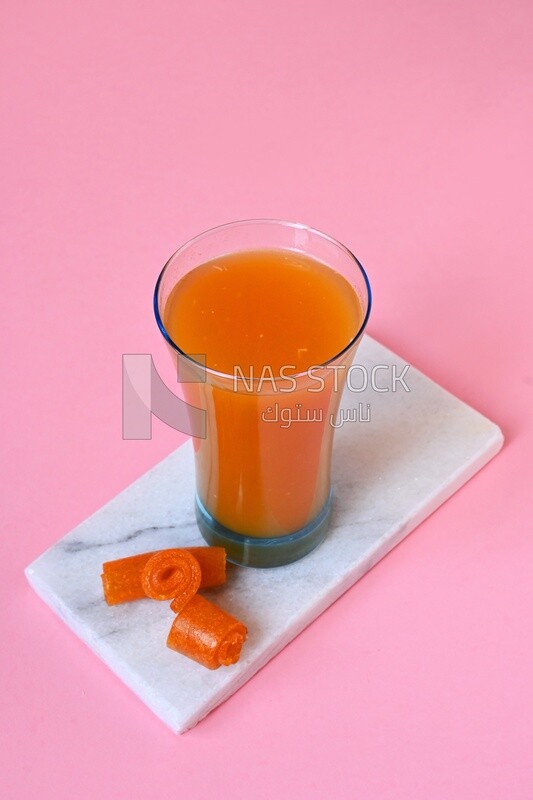 Cup of Qamar Al Deen juice with dried apricots, Ramadan juice, delicious juice, traditional juice