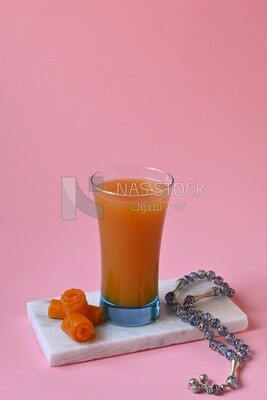 Cup of Qamar Al Deen juice with dried apricots, Ramadan juice, delicious juice, traditional juice
