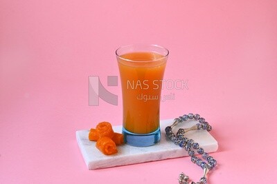 Cup of Qamar Al Deen juice with dried apricots, Ramadan juice, delicious juice, traditional juice