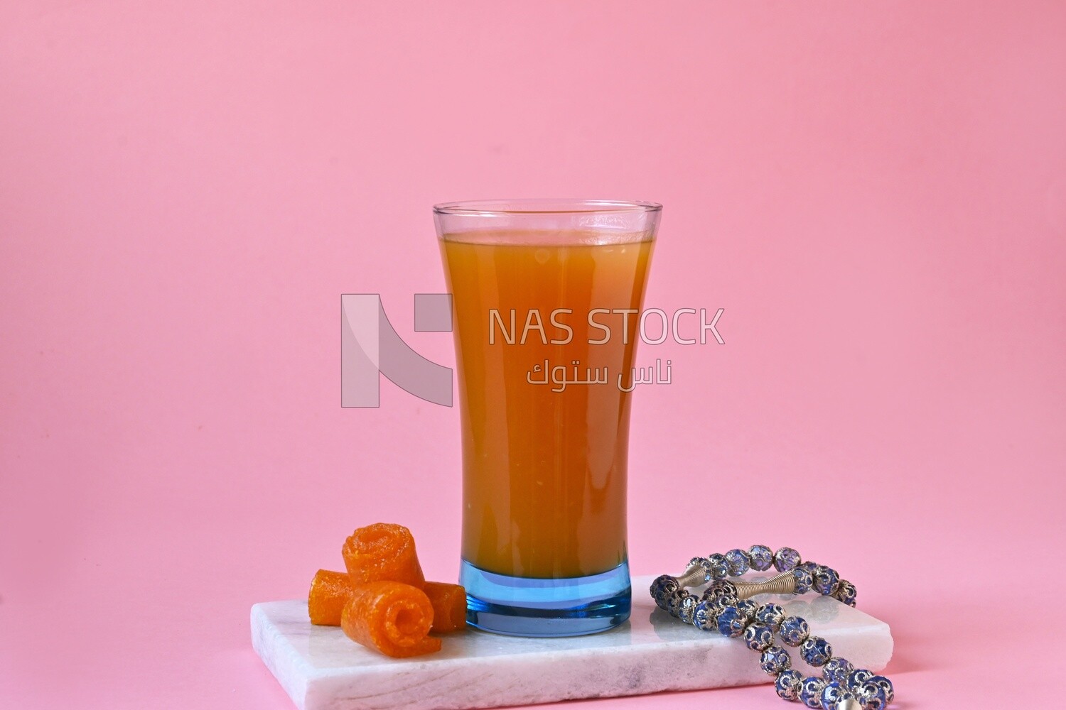 Cup of Qamar Al Deen juice with dried apricots, Ramadan juice, delicious juice, traditional juice