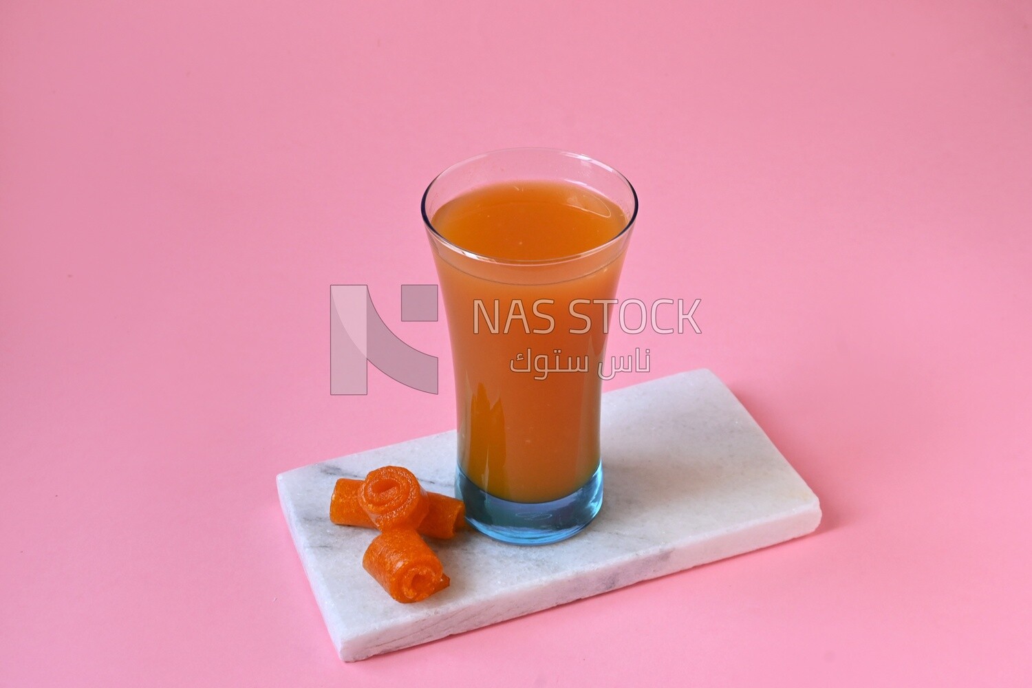 Cup of Qamar Al Deen juice with dried apricots, Ramadan juice, delicious juice, traditional juice