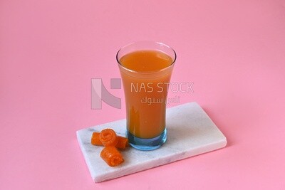 cup of Qamar Al Deen juice with dried apricots, Ramadan juice, delicious juice, traditional juice