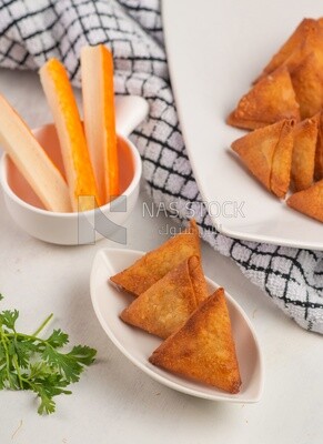 Plate of samosa, popular dishes, appetizers, Arabic dishes, oriental dishes, restaurants for oriental Arabic food, delicious meals