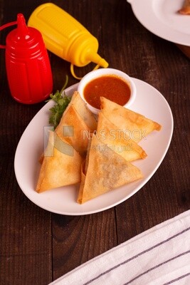 Plate of samosa with chili sauce, popular dishes, appetizers, Arabic dishes, oriental dishes, restaurants for oriental Arabic food, delicious meals