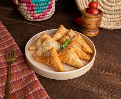 Plate of samosa, popular dishes, appetizers, Arabic dishes, oriental dishes, restaurants for oriental Arabic food, delicious meals