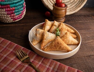 Plate of samosa, popular dishes, appetizers, Arabic dishes, oriental dishes, restaurants for oriental Arabic food, delicious meals