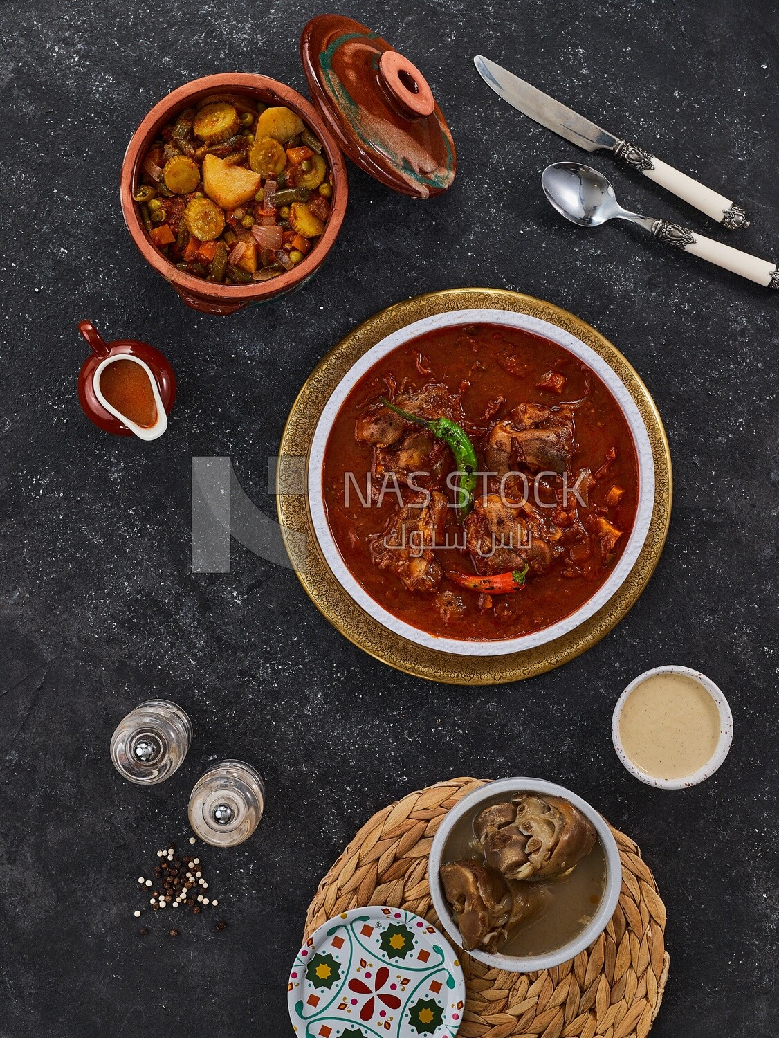 Bowl of trotters soup with vegetable torly, casserole of delicious trotter soup, Arabic meals, trotter soup