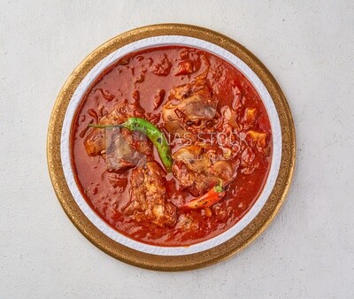 Bowl of trotters soup with red sauce, casserole of delicious trotter soup, Arabic meals, trotter soup
