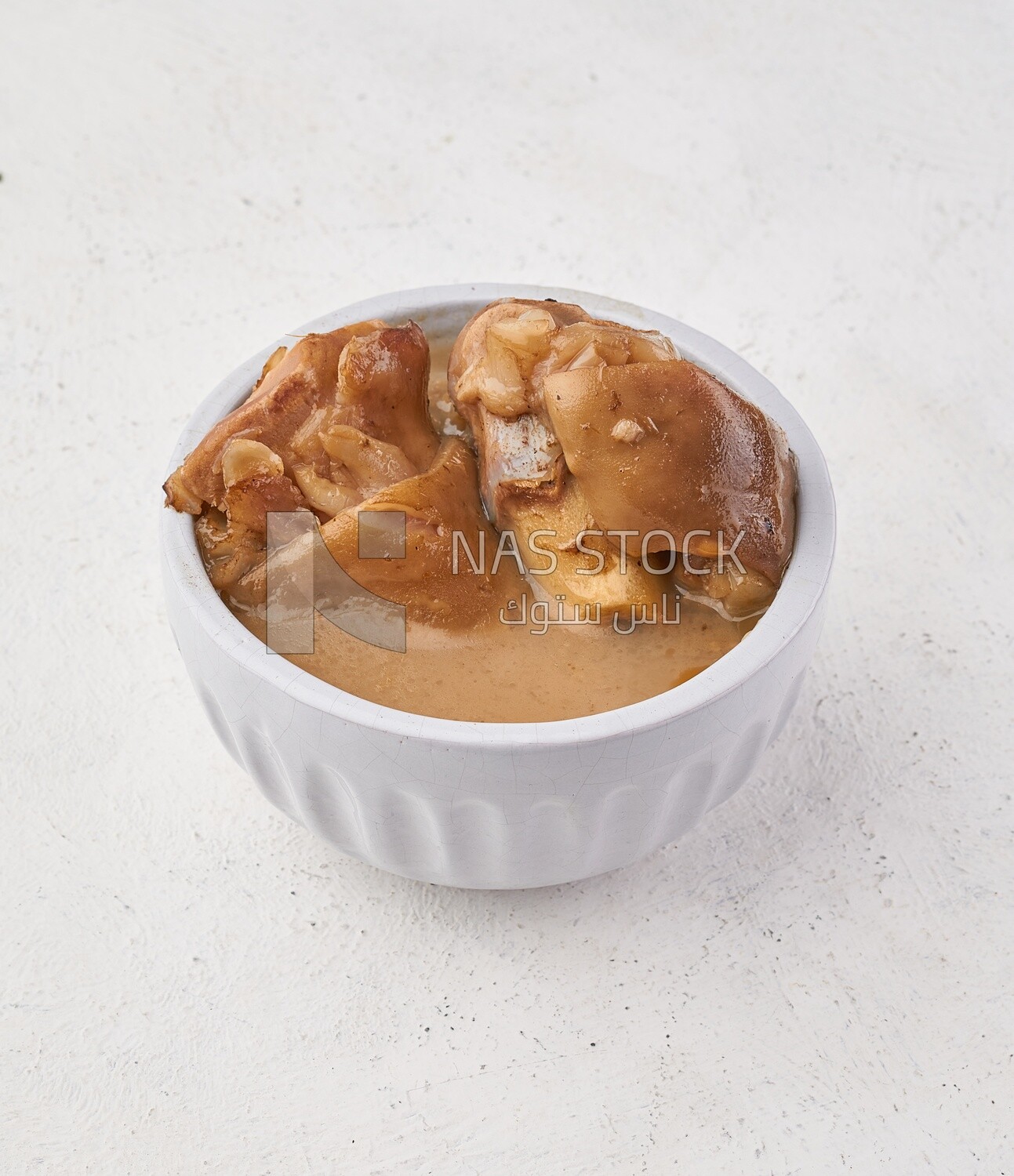 Bowl of trotters soup, casserole of delicious trotter soup, Arabic meals, trotter soup