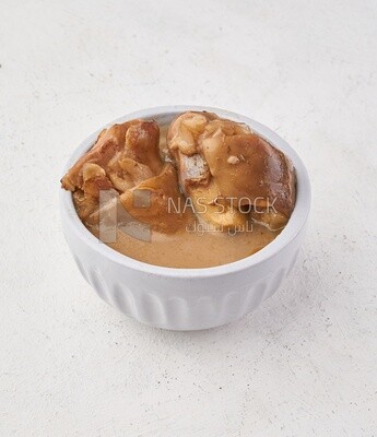 Bowl of trotters soup, casserole of delicious trotter soup, Arabic meals, trotter soup