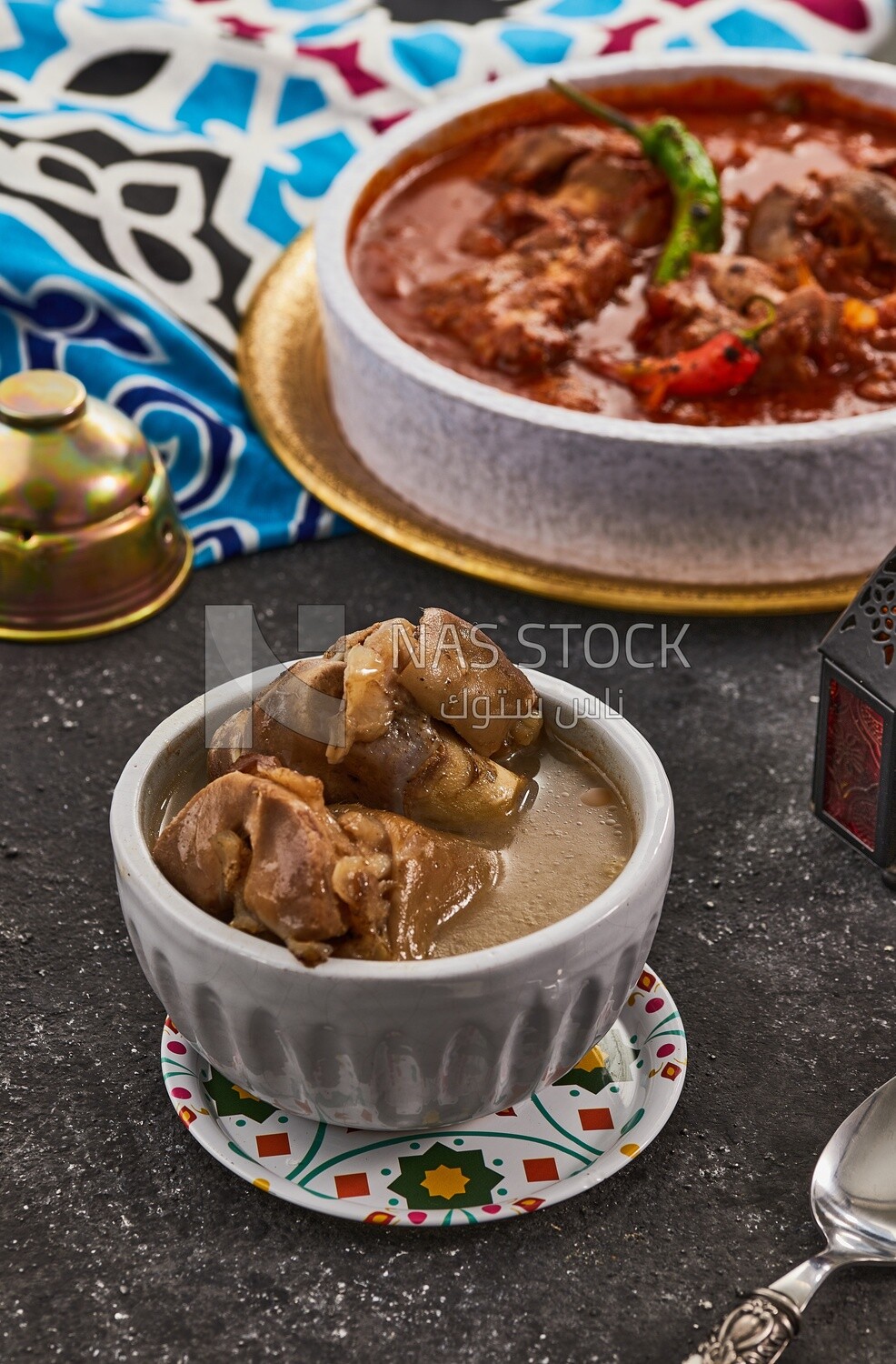 Bowl of trotters soup, casserole of delicious trotter soup, Arabic meals, trotter soup