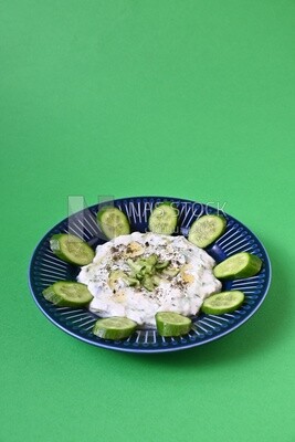 Plate of yogurt salad with cucumber, delicious salad, Arabic restaurants
