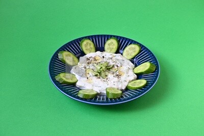 Plate of yogurt salad with cucumber, delicious salad, Arabic restaurants