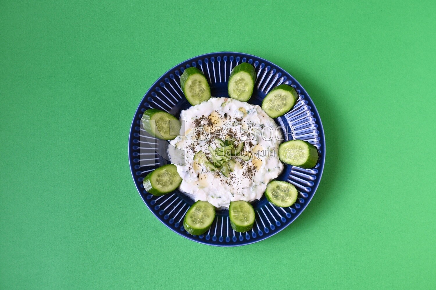 Plate of yogurt salad with cucumber, delicious salad, Arabic restaurants