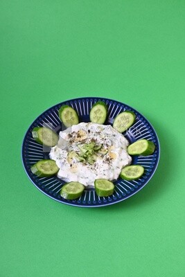 Plate of yogurt salad with cucumber, delicious salad, Arabic restaurants