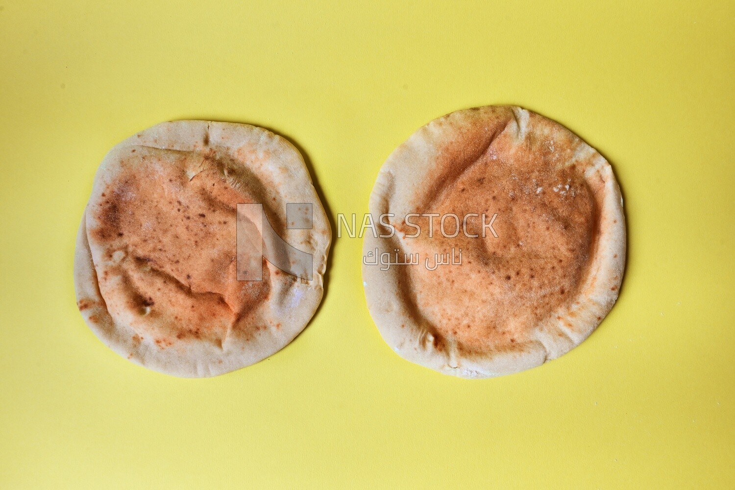 Shami bread, pieces of shami bread, fresh baked shami bread