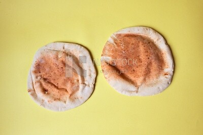 Shami bread, pieces of shami bread, fresh baked shami bread