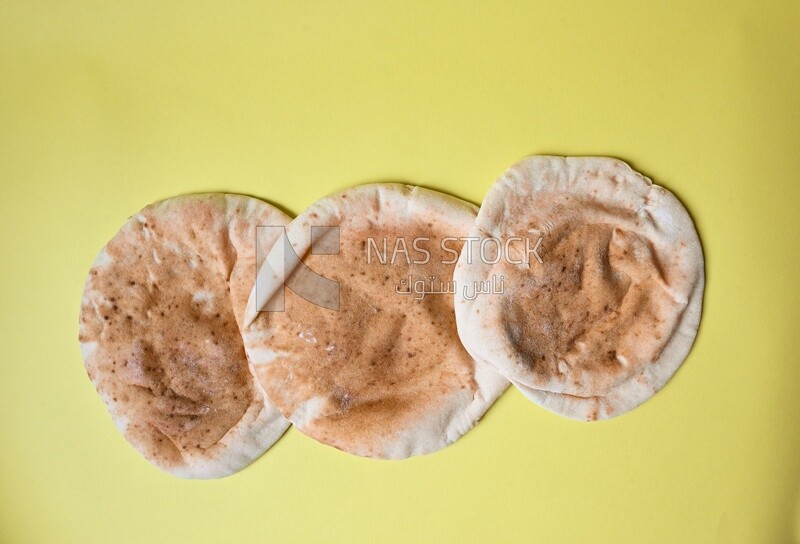 Shami bread, pieces of shami bread, fresh baked shami bread