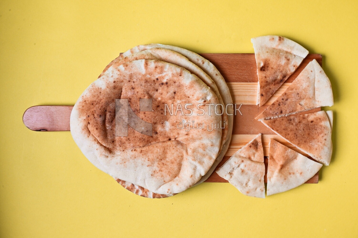 Shami bread, pieces of shami bread, fresh baked shami bread