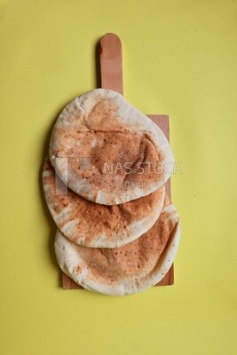 Shami bread, pieces of shami bread, fresh baked shami bread