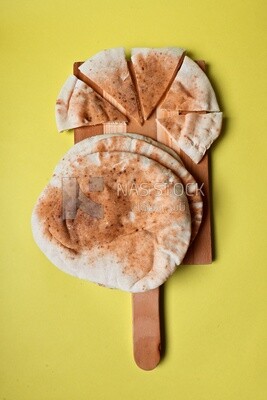 Shami bread, pieces of shami bread, fresh baked shami bread
