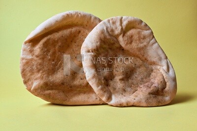 Shami bread, pieces of shami bread, fresh baked shami bread