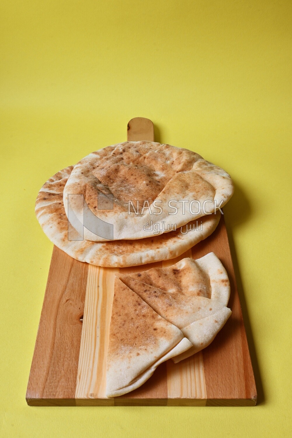 Shami bread, pieces of shami bread, fresh baked shami bread