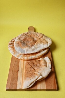 Shami bread, pieces of shami bread, fresh baked shami bread