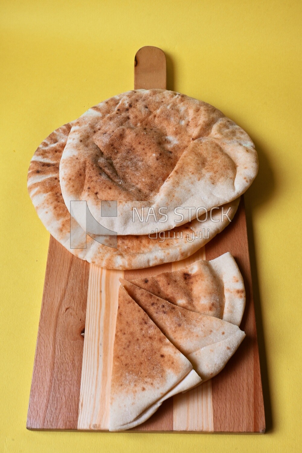 Shami bread, pieces of shami bread, fresh baked shami bread
