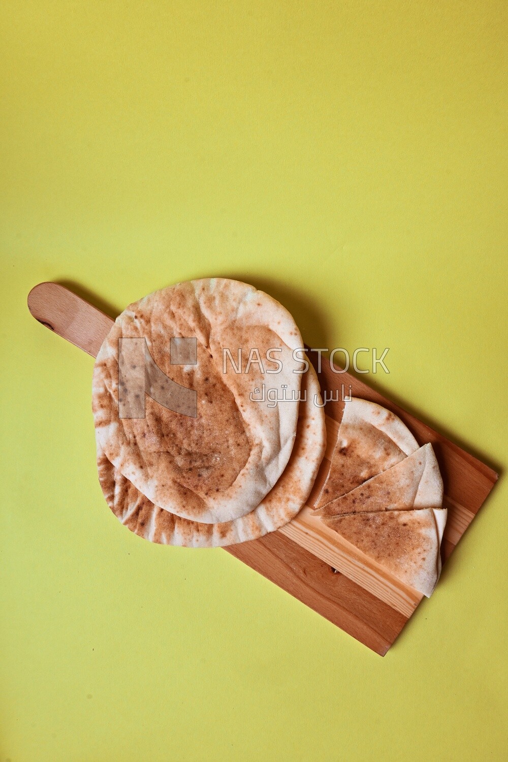 Shami bread, pieces of shami bread, fresh baked shami bread