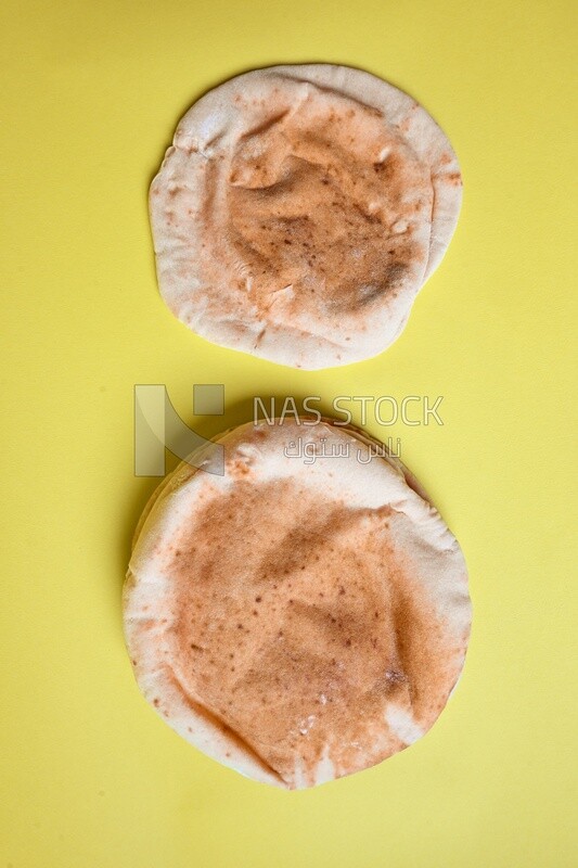 Shami bread, pieces of shami bread, fresh baked shami bread