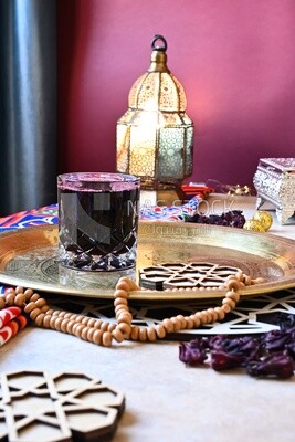 Cup of hibiscus on the table, Ramadan juice, delicious juice