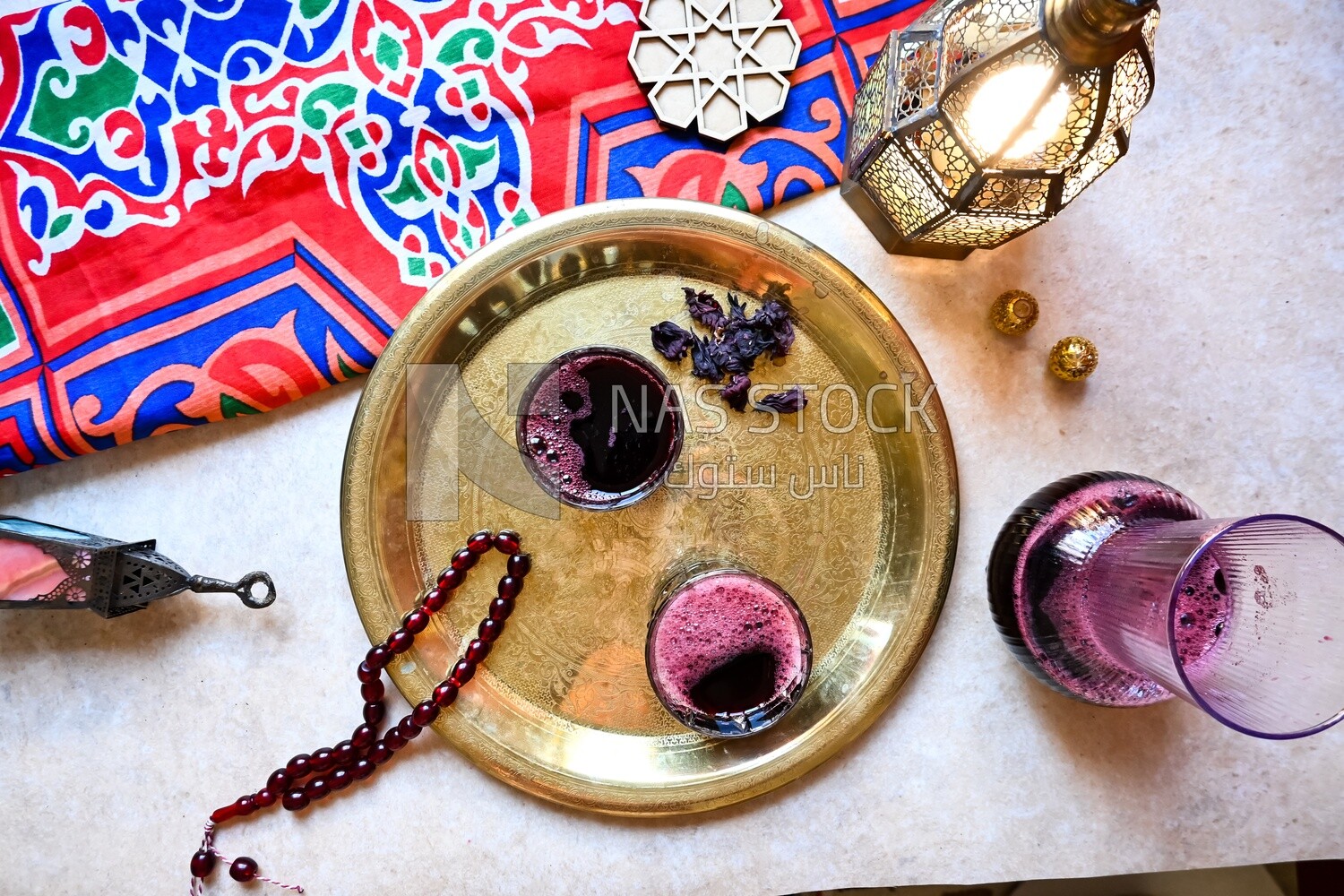 Two cups of hibiscus on the table, Ramadan juice, delicious juice