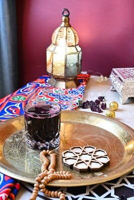 Cup of hibiscus on the table, Ramadan juice, delicious juice