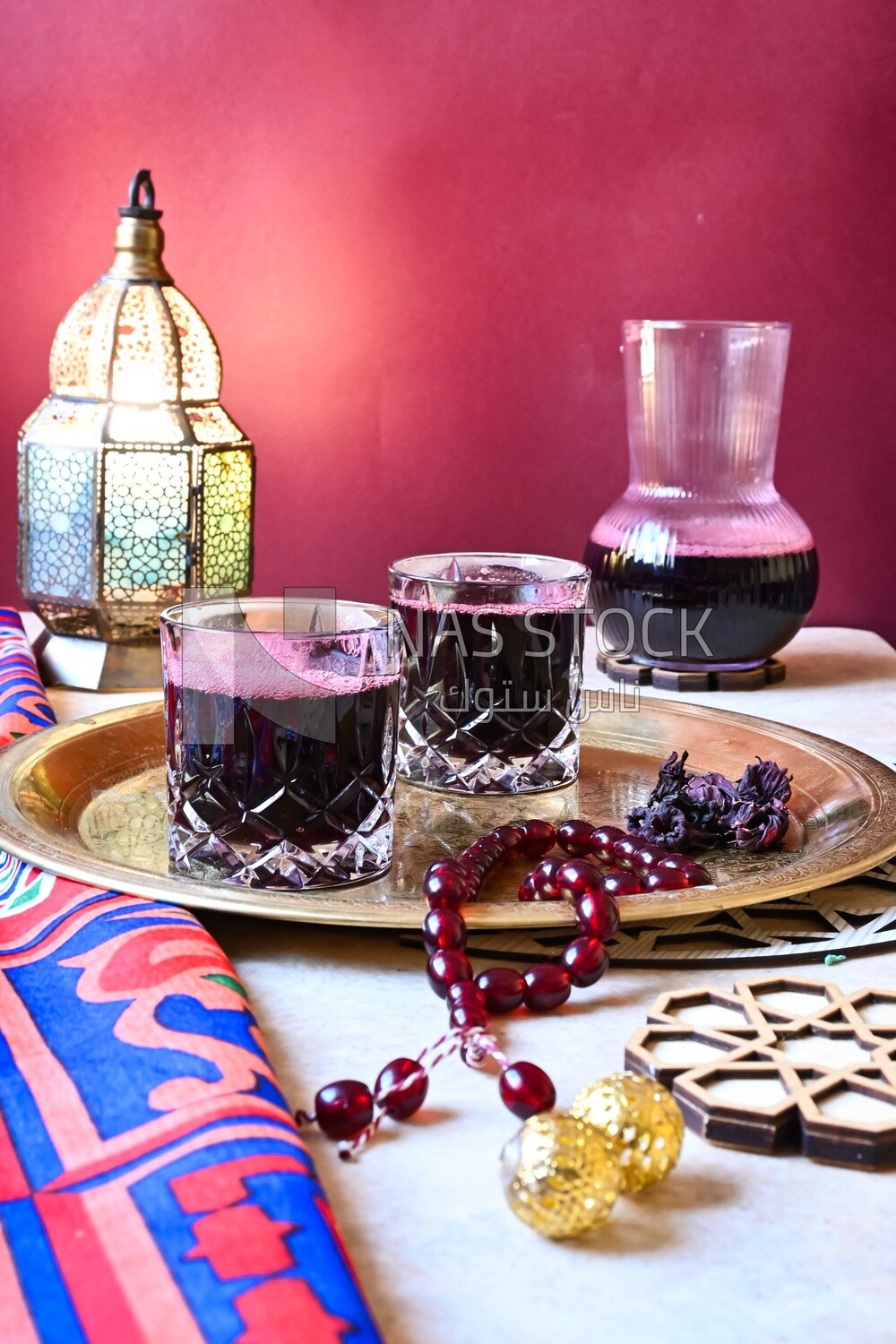 Two cups of hibiscus on the table, Ramadan juice, delicious juice