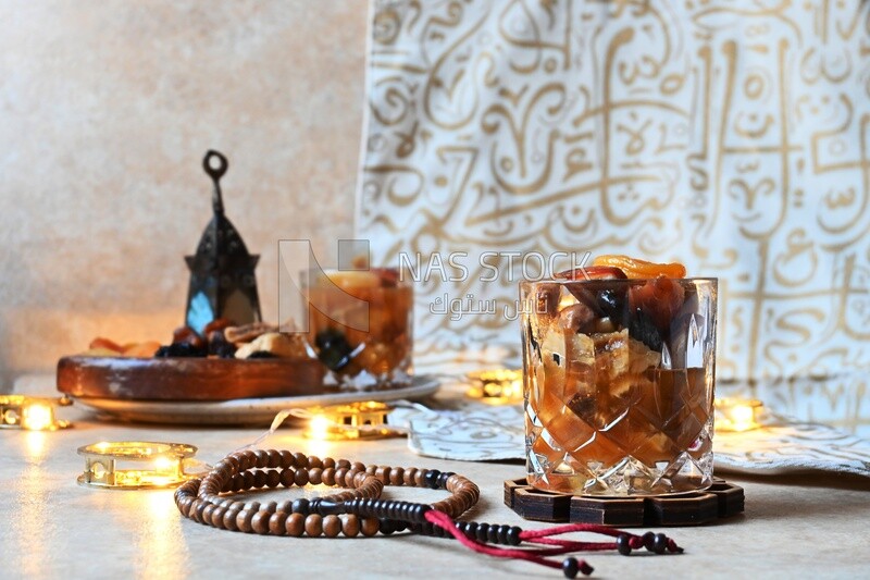 Cup of khoshaf, Dried Fruit, and nuts salad, delicious dessert, Ramadan juice, delicious juice, traditional juice
