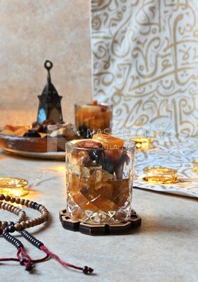 Cup of khoshaf, Dried Fruit, and nuts salad, delicious dessert, Ramadan juice, delicious juice, traditional juice
